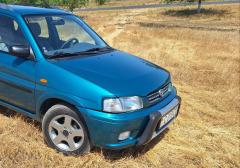 Легковые-Mazda-Demino